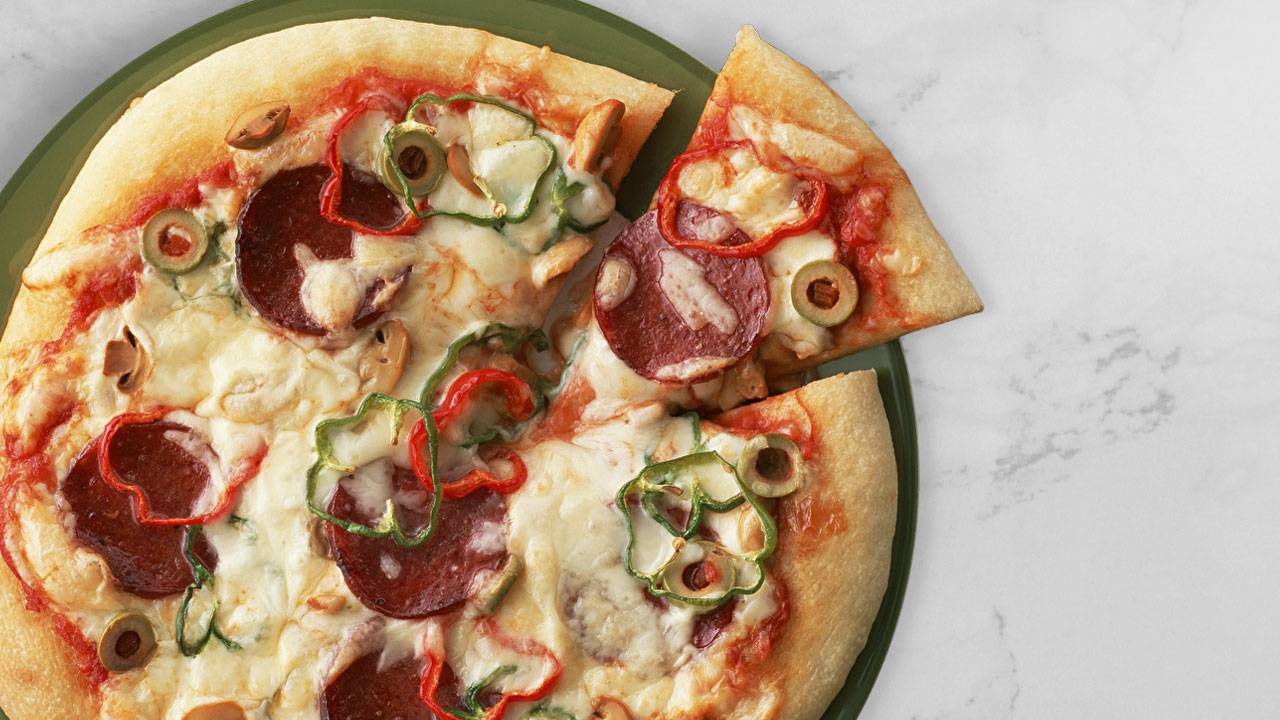 Filtrera restauranglistan på de som serverar "Pizza"
